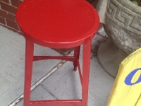 Vintage red metal stool