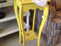 yellow plant stand