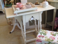 White drop leaf table
