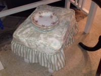 green-upholstered-footstool